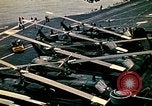Image of VNAF helicopters on USS Midway during evacuation from Saigon South China Sea, 1975, second 54 stock footage video 65675069509