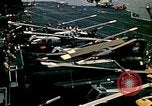 Image of VNAF helicopters on USS Midway during evacuation from Saigon South China Sea, 1975, second 58 stock footage video 65675069509