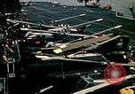 Image of VNAF helicopters on USS Midway during evacuation from Saigon South China Sea, 1975, second 59 stock footage video 65675069509