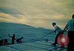 Image of Vietnamese evacuees board US Navy ship South China Sea, 1975, second 17 stock footage video 65675069510