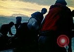Image of Vietnamese evacuees board US Navy ship South China Sea, 1975, second 31 stock footage video 65675069510