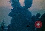 Image of helicopters thrown overboard during fall of Saigon South China Sea, 1975, second 4 stock footage video 65675069511