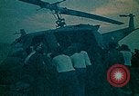 Image of helicopters thrown overboard during fall of Saigon South China Sea, 1975, second 22 stock footage video 65675069511