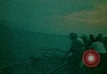 Image of helicopters thrown overboard during fall of Saigon South China Sea, 1975, second 27 stock footage video 65675069511