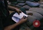 Image of a navy chaplain Vietnam, 1967, second 62 stock footage video 65675069513