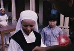 Image of a navy chaplain Vietnam, 1967, second 32 stock footage video 65675069516