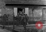 Image of US infantrymen searching for German snipers Haguenau France, 1944, second 28 stock footage video 65675069533