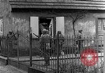 Image of US infantrymen searching for German snipers Haguenau France, 1944, second 32 stock footage video 65675069533