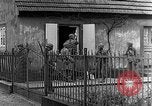 Image of US infantrymen searching for German snipers Haguenau France, 1944, second 39 stock footage video 65675069533