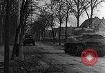 Image of US infantrymen searching for German snipers Haguenau France, 1944, second 52 stock footage video 65675069533