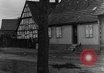 Image of US infantrymen searching for German snipers Haguenau France, 1944, second 57 stock footage video 65675069533
