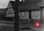 Image of US infantrymen searching for German snipers Haguenau France, 1944, second 58 stock footage video 65675069533