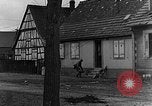 Image of US infantrymen searching for German snipers Haguenau France, 1944, second 60 stock footage video 65675069533
