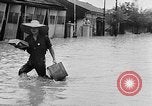 Standbild Schäden durch Überschwemmungen Japan, 1957, aus Sekunde 23 historischem Filmmaterial Videoclip 65675069537