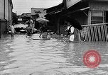 Standbild Schäden durch Überschwemmungen Japan, 1957, aus Sekunde 28 historischem Filmmaterial Videoclip 65675069537