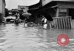 Standbild Schäden durch Überschwemmungen Japan, 1957, aus Sekunde 29 historischem Filmmaterial Videoclip 65675069537