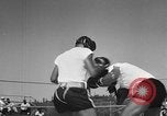 Immagine di Floyd Patterson Seattle Washington USA, 1957, secondo 50 filmato di repertorio 65675069549