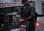 Image of Personnel buy food items Saigon Vietnam, 1965, second 9 stock footage video 65675069607