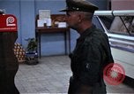 Image of Personnel buy food items Saigon Vietnam, 1965, second 16 stock footage video 65675069607