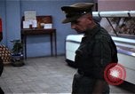 Image of Personnel buy food items Saigon Vietnam, 1965, second 17 stock footage video 65675069607