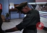 Image of Personnel buy food items Saigon Vietnam, 1965, second 19 stock footage video 65675069607