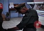 Image of Personnel buy food items Saigon Vietnam, 1965, second 20 stock footage video 65675069607