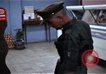 Image of Personnel buy food items Saigon Vietnam, 1965, second 21 stock footage video 65675069607