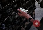 Image of Personnel buy food items Saigon Vietnam, 1965, second 27 stock footage video 65675069607