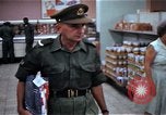 Image of Personnel buy food items Saigon Vietnam, 1965, second 30 stock footage video 65675069607