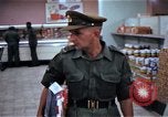 Image of Personnel buy food items Saigon Vietnam, 1965, second 31 stock footage video 65675069607