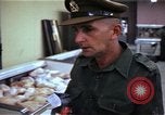 Image of Personnel buy food items Saigon Vietnam, 1965, second 37 stock footage video 65675069607