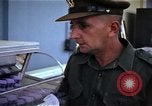 Image of Personnel buy food items Saigon Vietnam, 1965, second 38 stock footage video 65675069607
