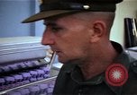 Image of Personnel buy food items Saigon Vietnam, 1965, second 39 stock footage video 65675069607