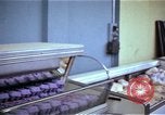 Image of Personnel buy food items Saigon Vietnam, 1965, second 40 stock footage video 65675069607