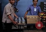 Image of Personnel buy food items Saigon Vietnam, 1965, second 46 stock footage video 65675069607