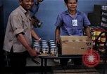 Image of Personnel buy food items Saigon Vietnam, 1965, second 47 stock footage video 65675069607
