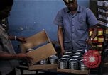 Image of Personnel buy food items Saigon Vietnam, 1965, second 50 stock footage video 65675069607