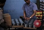Image of Personnel buy food items Saigon Vietnam, 1965, second 52 stock footage video 65675069607
