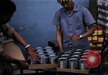 Image of Personnel buy food items Saigon Vietnam, 1965, second 54 stock footage video 65675069607