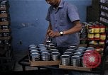 Image of Personnel buy food items Saigon Vietnam, 1965, second 59 stock footage video 65675069607