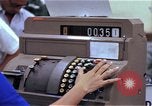 Image of Personnel buy food items Saigon Vietnam, 1965, second 60 stock footage video 65675069607