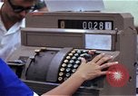 Image of Personnel buy food items Saigon Vietnam, 1965, second 62 stock footage video 65675069607