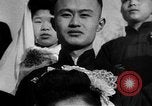 Image of mass Chinese wedding Shanghai China, 1948, second 57 stock footage video 65675069641