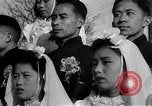 Image of mass Chinese wedding Shanghai China, 1948, second 60 stock footage video 65675069641