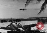 Image of Airstrip being used while under construction  Ulithi Atoll Caroline Islands, 1944, second 32 stock footage video 65675069718