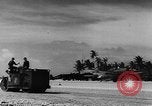 Image of Airstrip being used while under construction  Ulithi Atoll Caroline Islands, 1944, second 40 stock footage video 65675069718