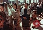 Image of worshipers at a chapel Nagasaki Japan, 1946, second 22 stock footage video 65675069727