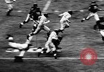 Standbild American Football Match New York United States USA, 1957, aus Sekunde 13 historischem Filmmaterial Videoclip 65675069761