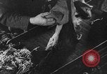 Image of collection of clothes Germany, 1942, second 51 stock footage video 65675069774