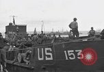 Image of Loading Allied landing craft  for D-Day invasion of France England United Kingdom, 1944, second 3 stock footage video 65675069838